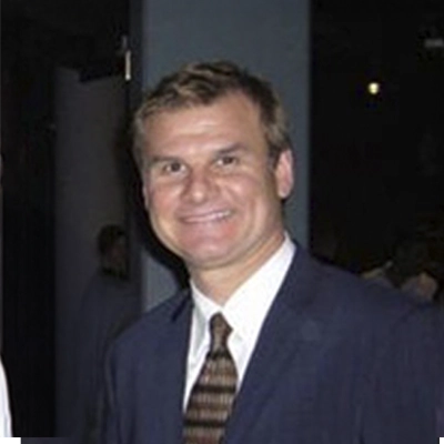 A headshot of Dr. Andrew Adamski D.C., a chiropractor at Appleview Chiropractic.